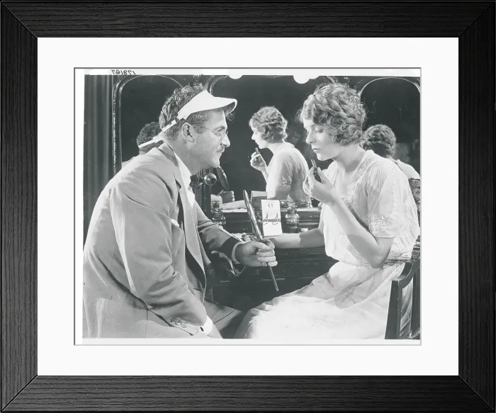 Framed Print : Man Holding Mirror For Actress