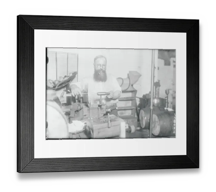 Framed Print : Man Working on His Invention