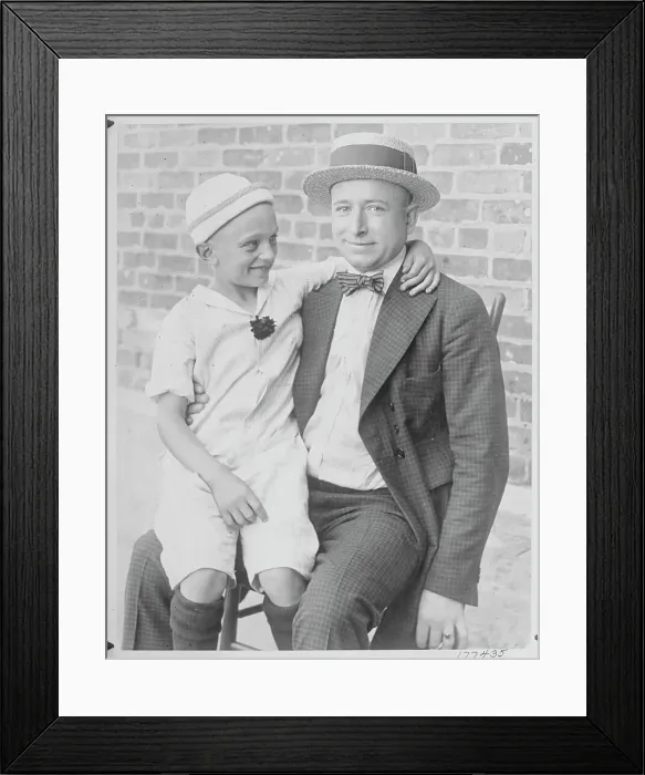 Framed Print : John Gorecki Holding His Young Son Framed Print : John Gorecki Holding His Young Son