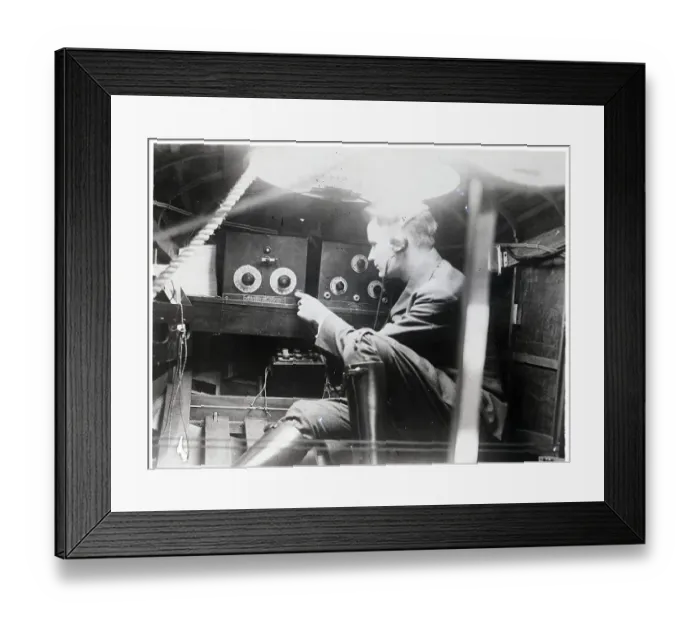 Framed Print : Radio Operator Turning Radio Up Framed Print : Radio Operator Turning Radio Up