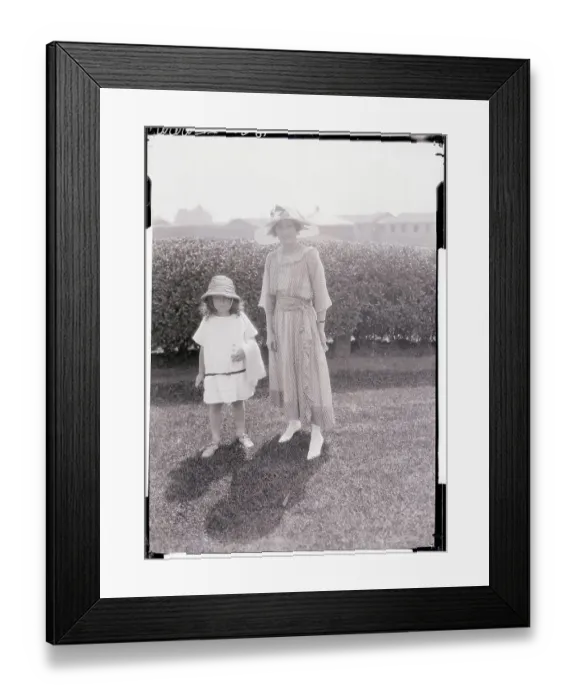 Framed Print : Socialite and Daughter Posing Outdoors Framed Print : Socialite and Daughter Posing Outdoors