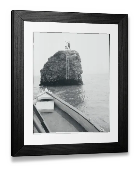Framed Print : Man Standing on Pillar Rock Framed Print : Man Standing on Pillar Rock