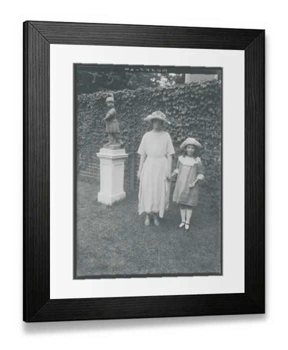 Framed Print : Socialite Posing with Young Girl Framed Print : Socialite Posing with Young Girl