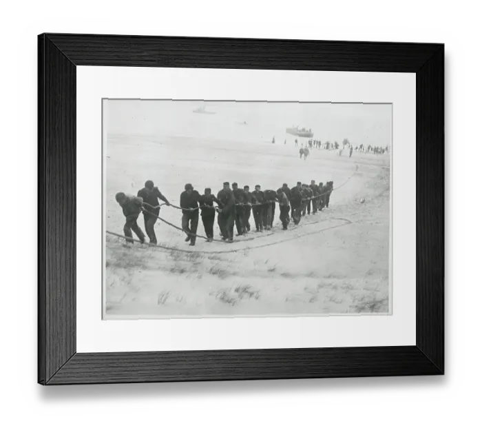 Framed Print : Men Pulling Cable on Shoreline Framed Print : Men Pulling Cable on Shoreline