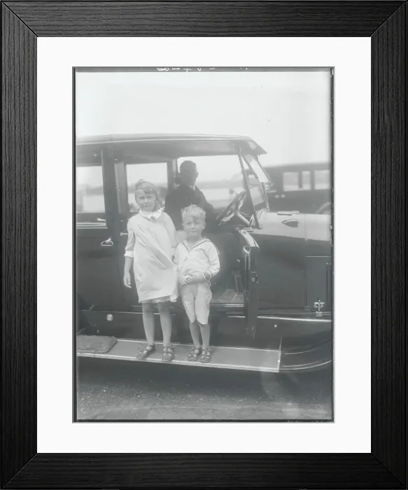 Framed Print : Young Socialites next to Chauffeured Automobile Framed Print : Young Socialites next to Chauffeured Automobile