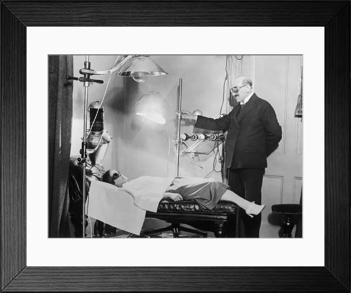 Framed Print : Doctor Treating Patient with Ultraviolet Rays Framed Print : Doctor Treating Patient with Ultraviolet Rays