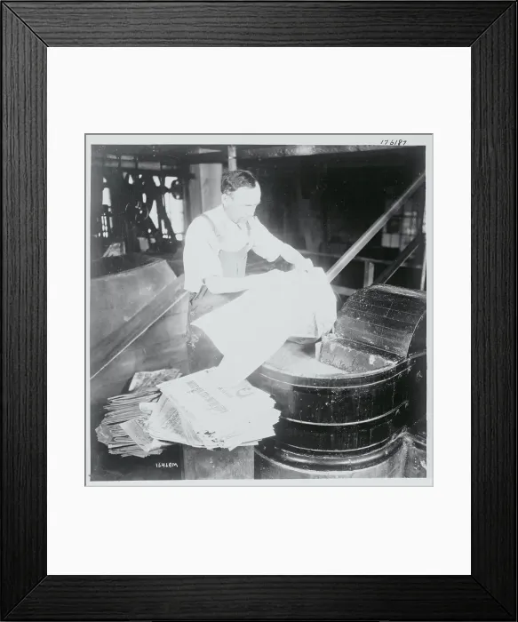Framed Print : Man De-Inking Old Newspapers Framed Print : Man De-Inking Old Newspapers