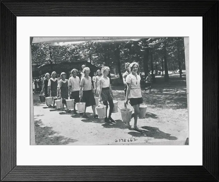 Framed Print : Older German Youngsters Carrying Pails Framed Print : Older German Youngsters Carrying Pails