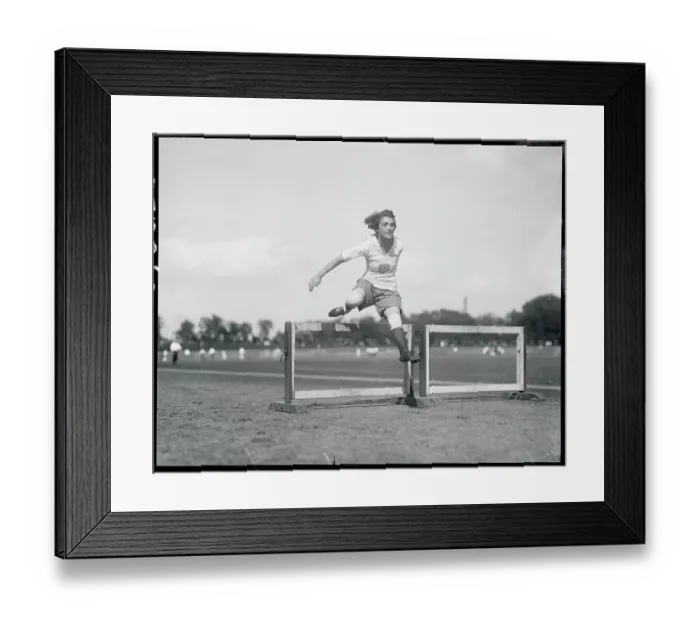 Framed Print : Woman Jumping Hurdle Framed Print : Woman Jumping Hurdle