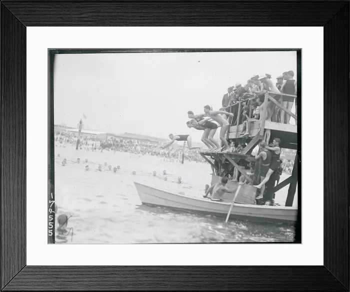 Framed Print : Men Diving Into Water