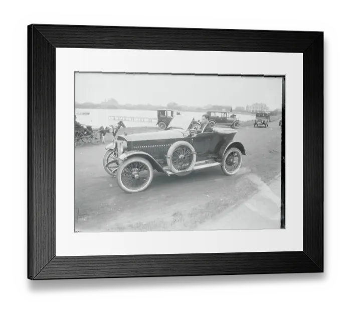 Framed Print : Man Riding in New German Car