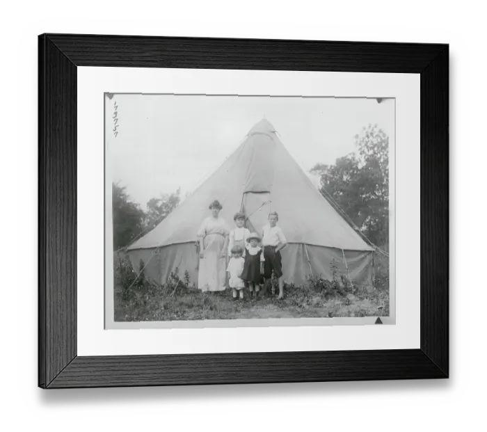 Framed Print : Family Posing in Front of Tent Framed Print : Family Posing in Front of Tent