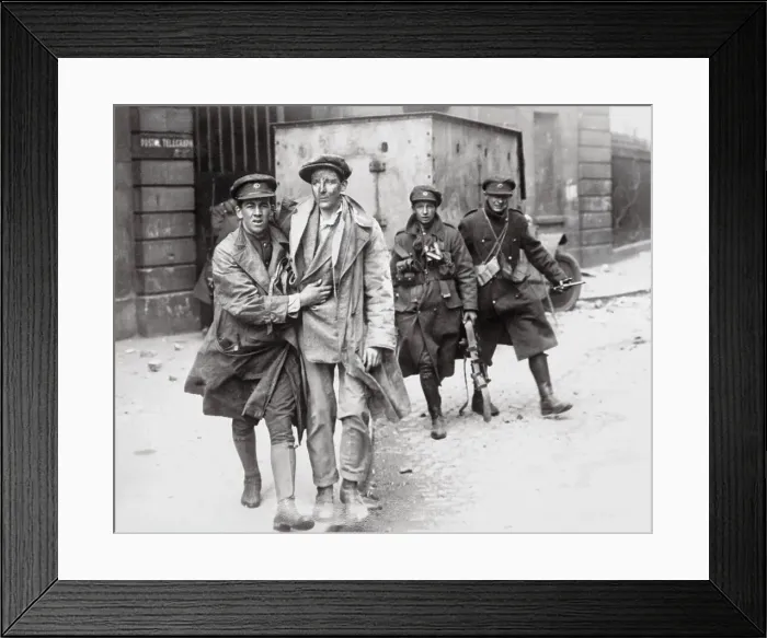 Framed Print : Soldier Helping an Injured Man Framed Print : Soldier Helping an Injured Man