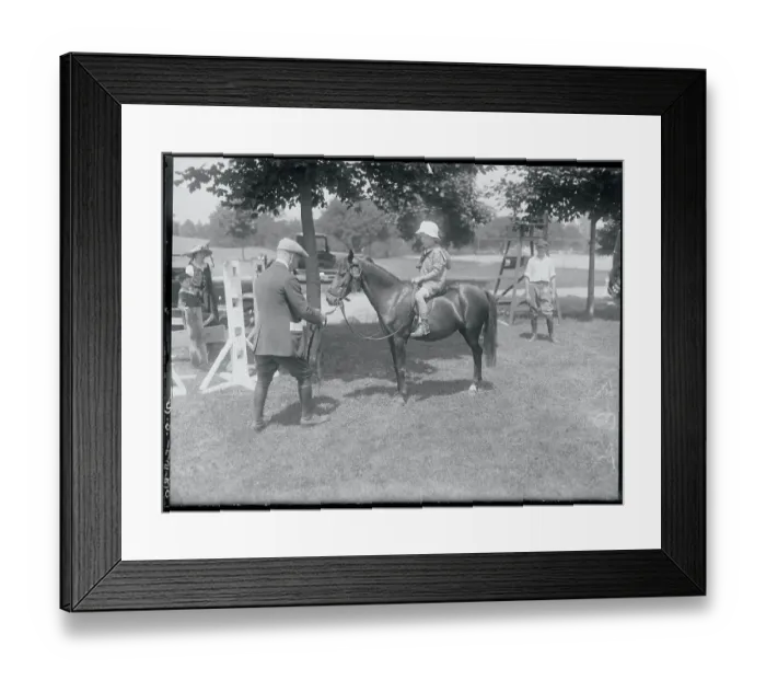 Framed Print : Boy Riding a Pony Framed Print : Boy Riding a Pony