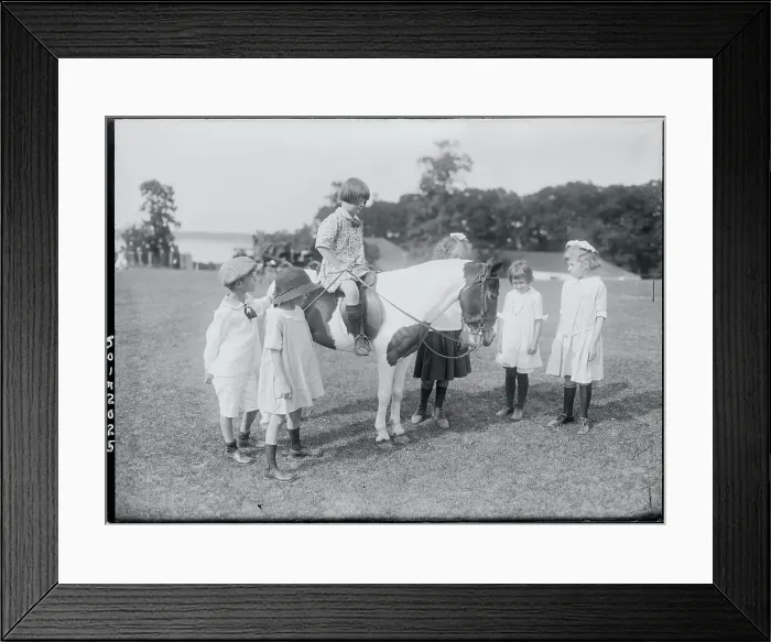 Framed Print : Children Admiring a Pony Framed Print : Children Admiring a Pony