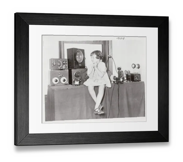 Framed Print : Girl Listening to a Radio Framed Print : Girl Listening to a Radio