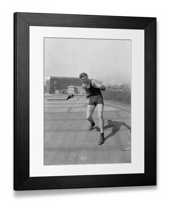Framed Print : Jack Dempsey Conditioning Himself Framed Print : Jack Dempsey Conditioning Himself
