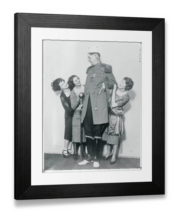 Framed Print : Young Women Embracing Very Tall Gentleman Framed Print : Young Women Embracing Very Tall Gentleman