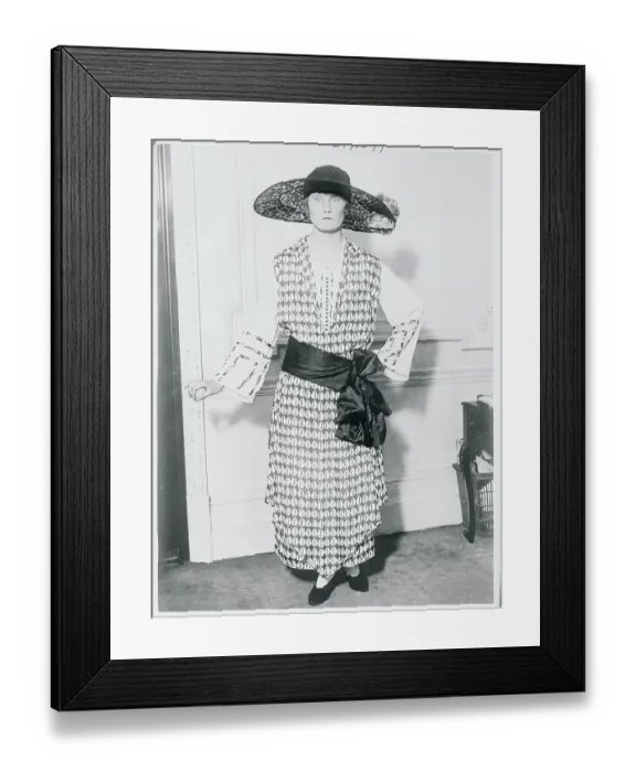 Framed Print : Model Posing in Feminine Dress and Hat Framed Print : Model Posing in Feminine Dress and Hat