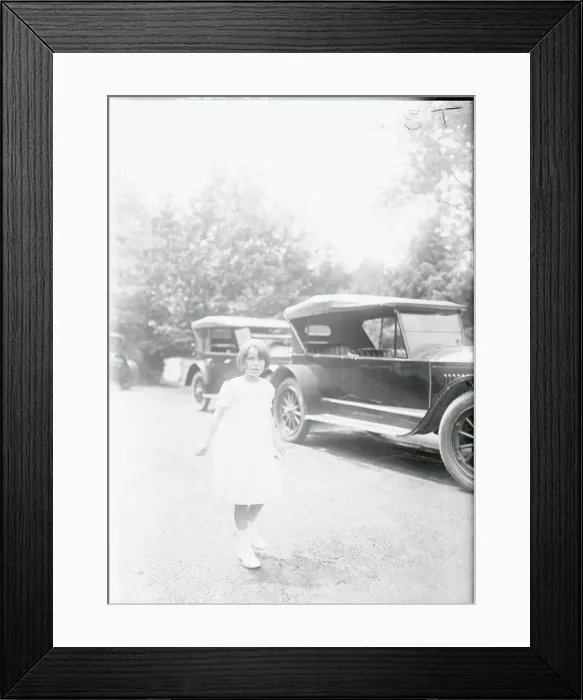 Framed Print : Girl Strolling Past Automobiles Framed Print : Girl Strolling Past Automobiles