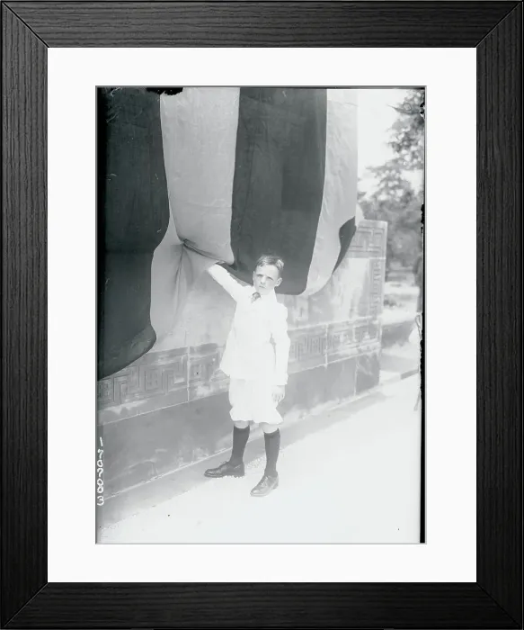 Framed Print : Boy Lifting Awning Framed Print : Boy Lifting Awning