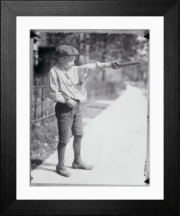 Framed Print : Boy Holding a Firecracker Framed Print : Boy Holding a Firecracker