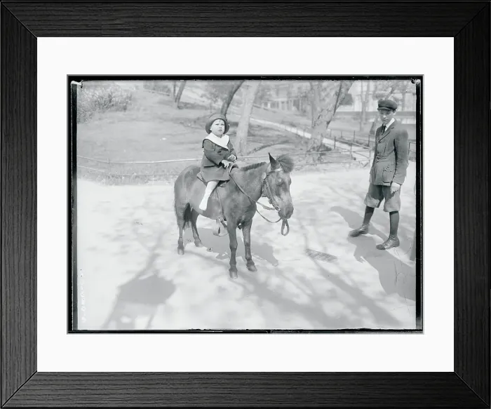Framed Print : Little Boy Riding Pony