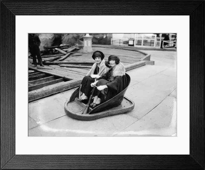 Framed Print : Two Women Riding in a Bumper Car Framed Print : Two Women Riding in a Bumper Car