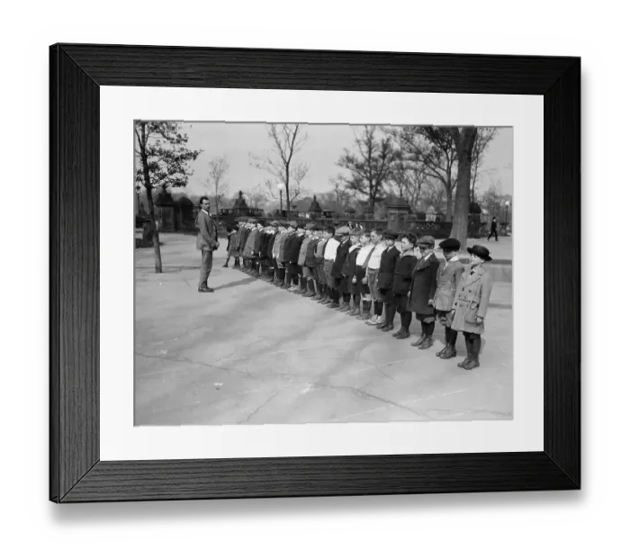 Framed Print : School boys (10-12 years) standing in line in park. New York City, New York State, USA. May 03, 1922 Framed Print : School boys (10-12 years) standing in line in park. New York City, New York State, USA. May 03, 1922