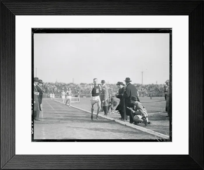 Framed Print : Runner Crossing the Finish Line Framed Print : Runner Crossing the Finish Line