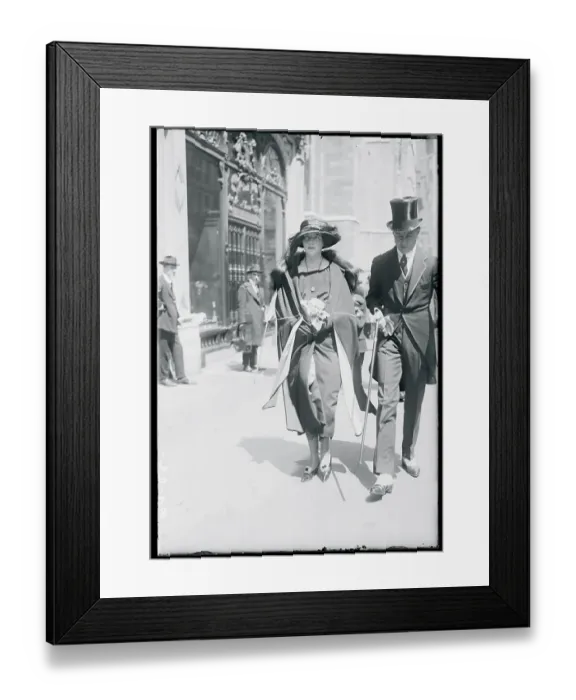 Framed Print : Man and Woman Strolling Down a Street Framed Print : Man and Woman Strolling Down a Street