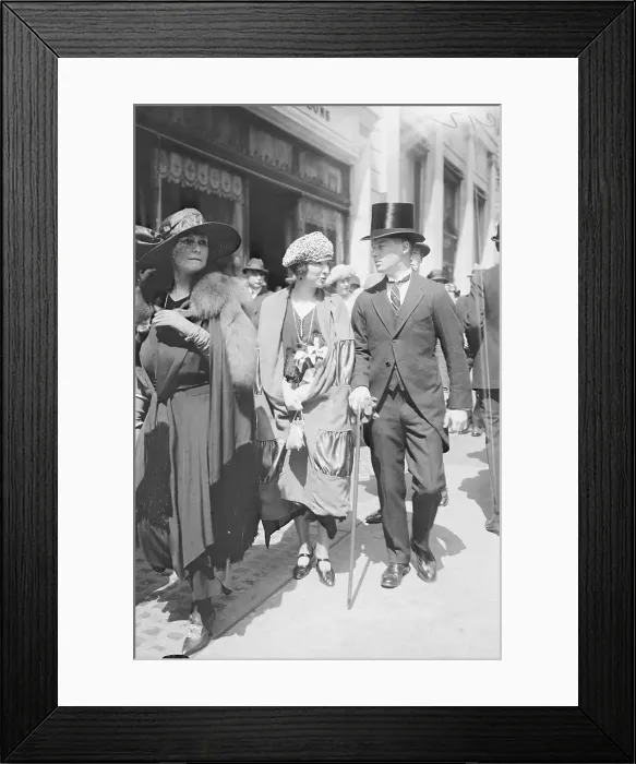 Framed Print : Man and Woman Strolling Down a Street Framed Print : Man and Woman Strolling Down a Street