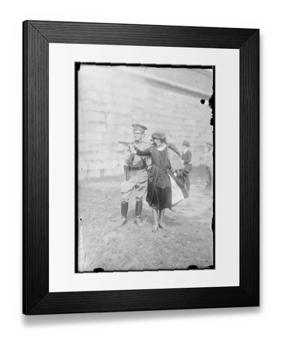 Framed Print : Woman Aiming a Gun Framed Print : Woman Aiming a Gun