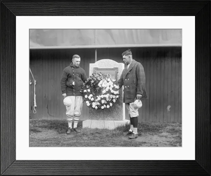 Framed Print : Two Men Placing a Wreath on a Monument Framed Print : Two Men Placing a Wreath on a Monument