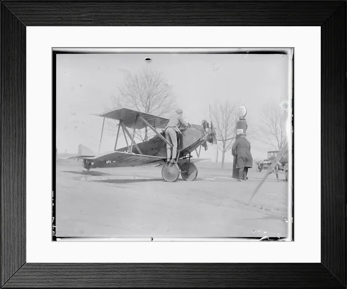 Framed Print : Men Refueling an Airplane From Fuel Pump Framed Print : Men Refueling an Airplane From Fuel Pump