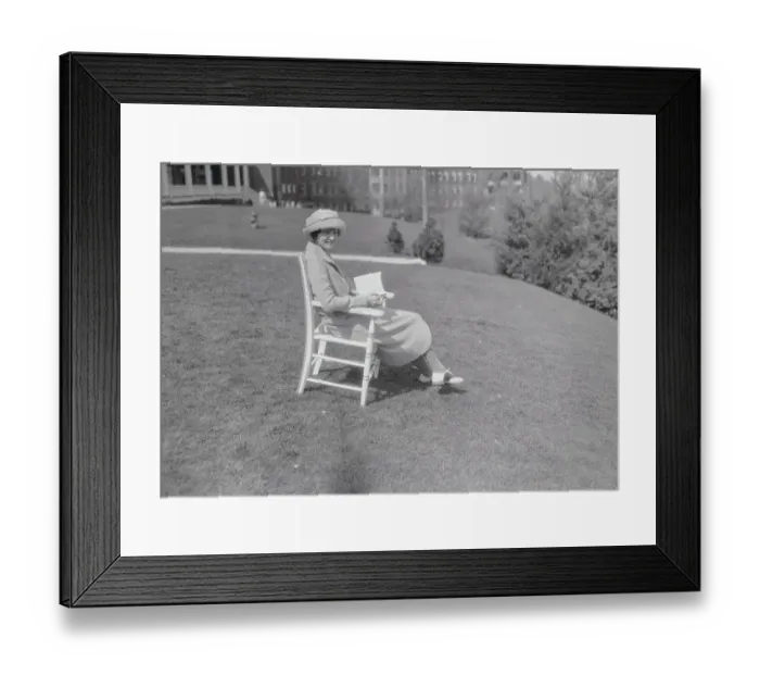 Framed Print : Socialite Woman Relaxing on a Lawn Framed Print : Socialite Woman Relaxing on a Lawn