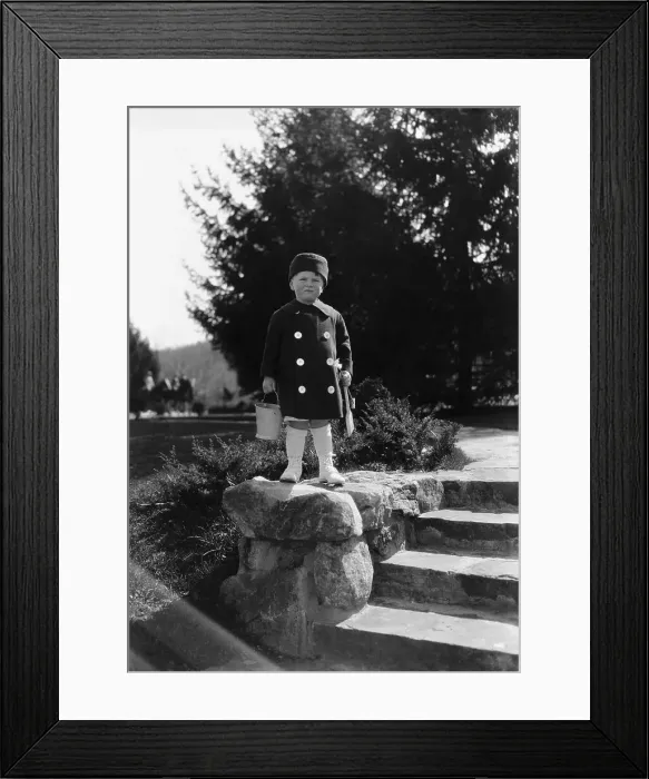 Framed Print : Boy (6-7 years) posing on rock with bucket. Hot Springs, Virginia, USA. April 05, 1922 Framed Print : Boy (6-7 years) posing on rock with bucket. Hot Springs, Virginia, USA. April 05, 1922