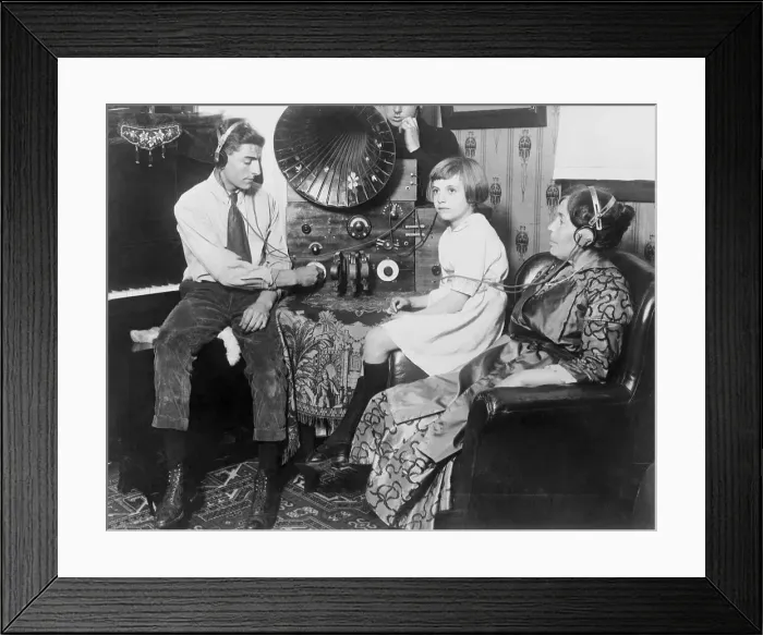 Framed Print : Family Listening to a Radio Framed Print : Family Listening to a Radio