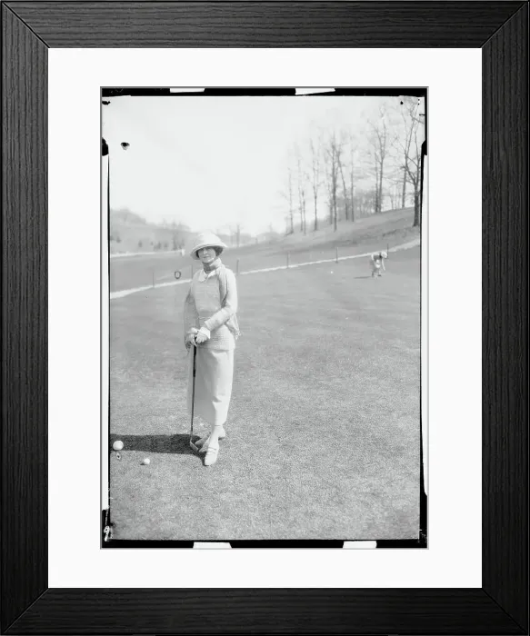 Framed Print : Woman Holding a Golf Club Framed Print : Woman Holding a Golf Club