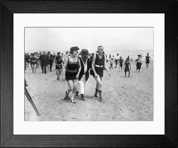 Framed Print : Bathers Being Escorted from Beach