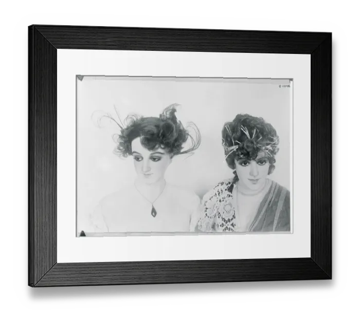 Framed Print : Two Women Modeling Different Hairstyles Framed Print : Two Women Modeling Different Hairstyles