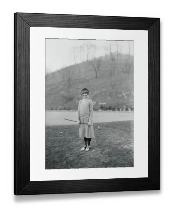 Framed Print : Woman Holding a Golf Club Framed Print : Woman Holding a Golf Club