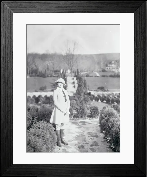 Framed Print : Female Socialite Posing Outdoors Framed Print : Female Socialite Posing Outdoors