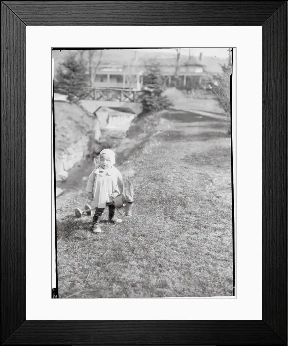 Framed Print : Female Toddler in Park Near Small Bridge Framed Print : Female Toddler in Park Near Small Bridge