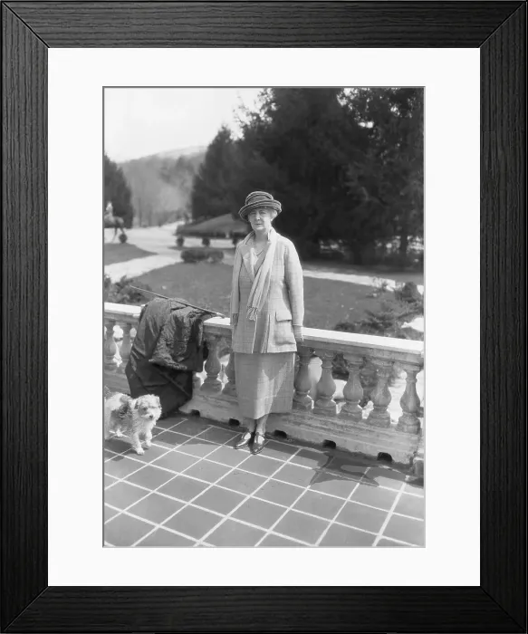 Framed Print : Socialite Woman Posing with Dog on Balcony Framed Print : Socialite Woman Posing with Dog on Balcony