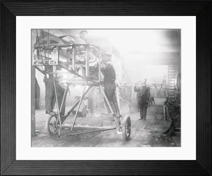 Framed Print : Cuno Rheden Working on Plane