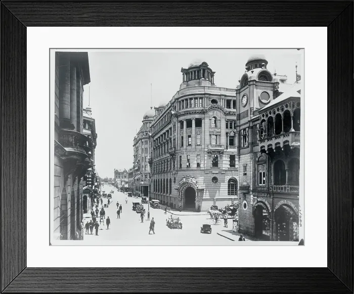 Framed Print : View of Large Buildings with Pedestrians Framed Print : View of Large Buildings with Pedestrians