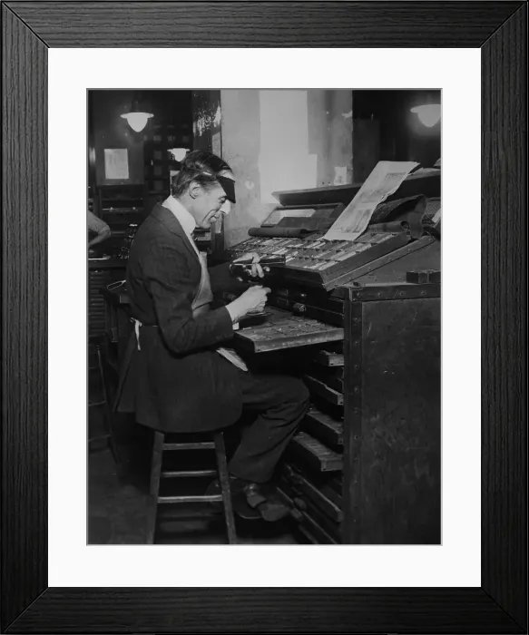 Framed Print : D. W. Griffith Working at Typesetting Machine Framed Print : D. W. Griffith Working at Typesetting Machine