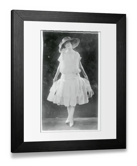 Framed Print : Woman Modeling a Tea Frock Framed Print : Woman Modeling a Tea Frock
