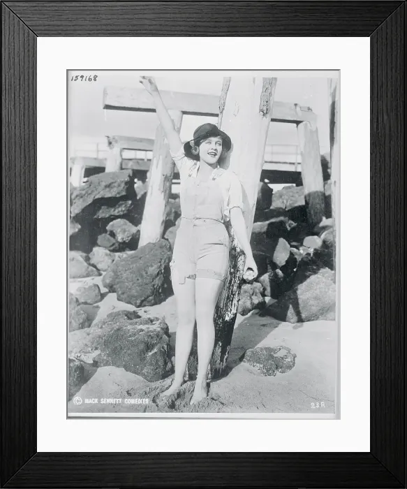 Framed Print : Phyllis Haver Wearing Shorts Outfit on the Beach Framed Print : Phyllis Haver Wearing Shorts Outfit on the Beach
